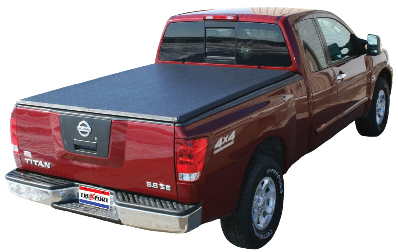 Load image into Gallery viewer, Truxedo 04-15 Nissan Titan w/Track System 5ft 6in TruXport Bed Cover
