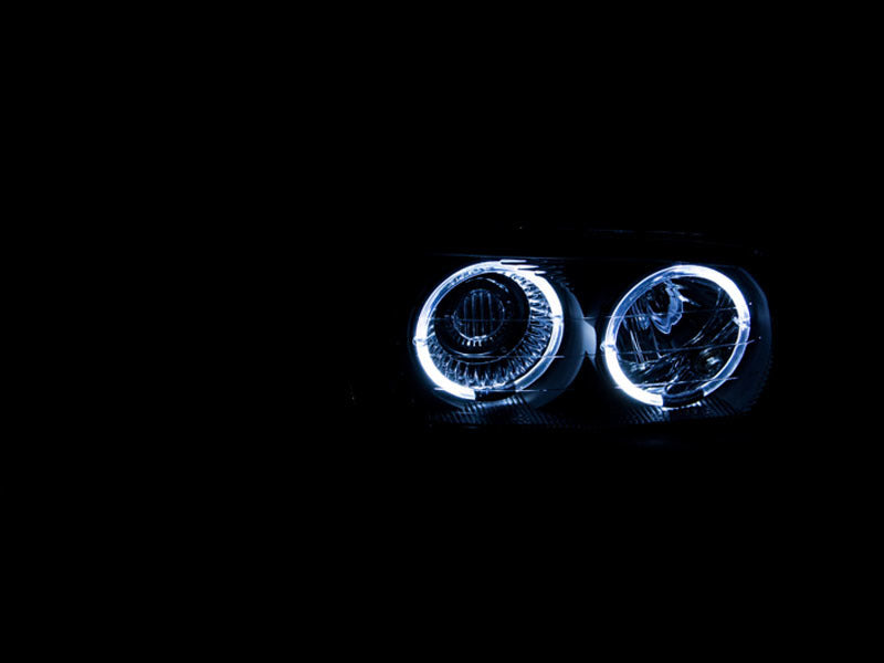 Load image into Gallery viewer, ANZO 1999-2006 Gmc Sierra 1500 Projector Headlights w/ Halo Black
