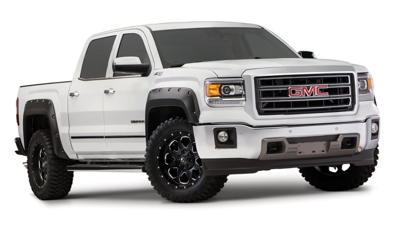 Load image into Gallery viewer, Bushwacker 14-15 GMC Sierra 1500 Pocket Style Flares 4pc - Black
