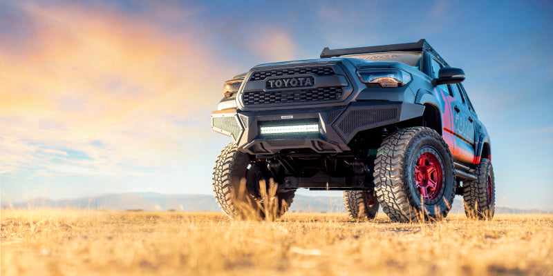 Load image into Gallery viewer, Go Rhino 16-21 Tacoma Element Front Bumper w/ Power Actuated Hide-away Light Bar Mount Tex Black
