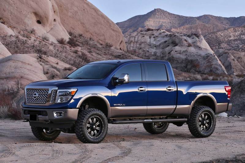 Load image into Gallery viewer, Fabtech 14-17 Nissan Titan 4WD 6in Basic Sys w/Perf Shks
