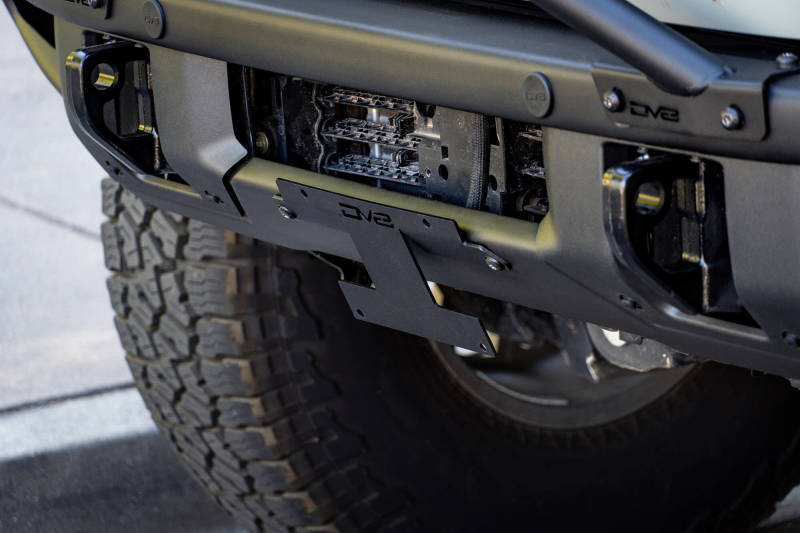 Load image into Gallery viewer, DV8 Offroad 21-22 Ford Bronco Factory Front Bumper Licence Relocation Bracket - Front
