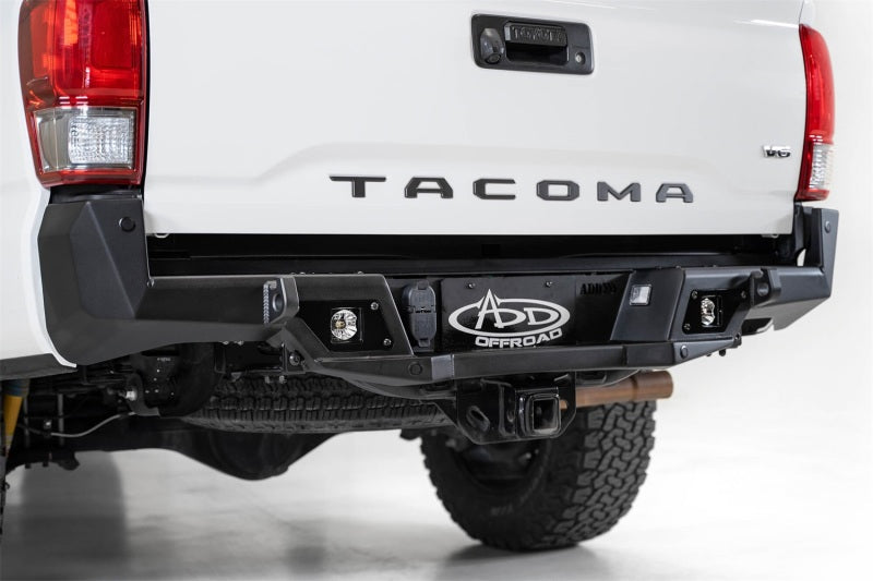 Load image into Gallery viewer, Addictive Desert Designs 16-19 Toyota Tacoma Stealth Fighter Rear Bumper w/ Backup Sensor Cutouts
