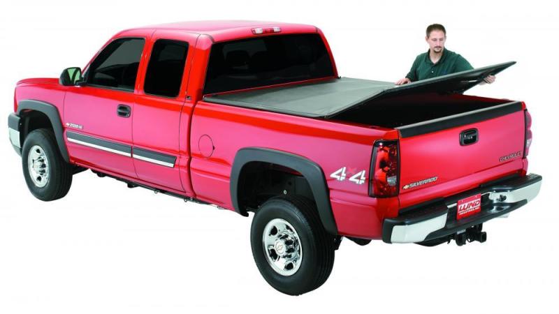 Load image into Gallery viewer, Lund 15-18 Ford F-150 (5.5ft. Bed) Genesis Tri-Fold Tonneau Cover - Black
