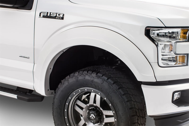 Load image into Gallery viewer, Bushwacker 15-17 Ford F-150 Styleside Extend-A-Fender Style Flares 4pc 67.1/78.9/97.6in Bed - Black
