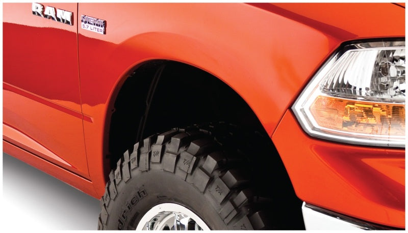 Load image into Gallery viewer, Bushwacker 10-18 Ram 1500 Fleetside Extend-A-Fender Style Flares 4pc 67.4/76.3/96.3in Bed - Black
