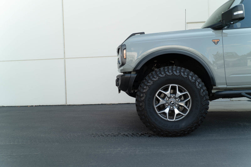 Load image into Gallery viewer, DV8 Offroad 21-23 Ford Bronco Capable Bumper Front License Plate Mount
