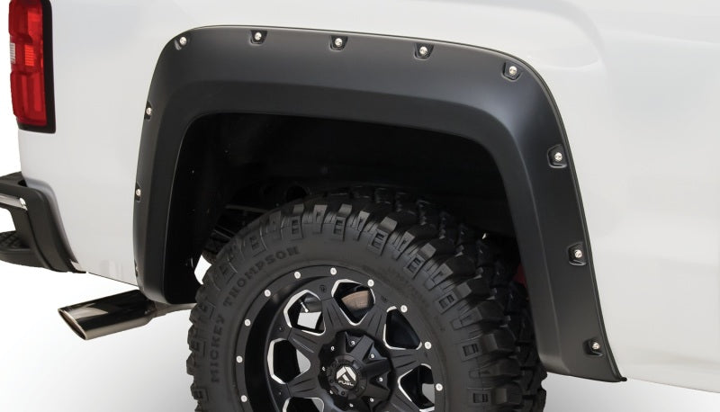 Load image into Gallery viewer, Bushwacker 14-15 GMC Sierra 1500 Pocket Style Flares 4pc - Black
