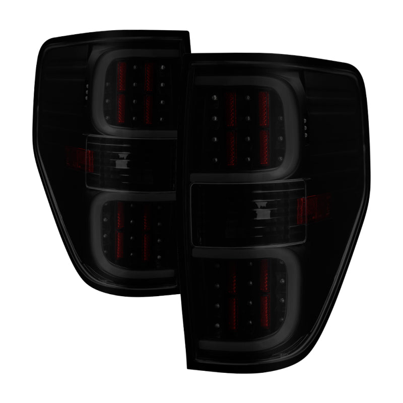 Load image into Gallery viewer, xTune Ford F150 09-14 LED Tail Lights - Black ALT-ON-FF15009-LBLED-BSM
