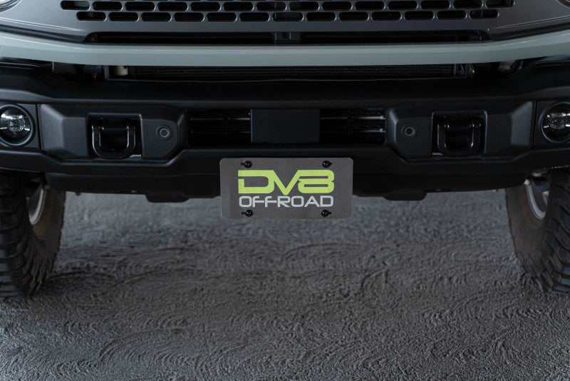 Load image into Gallery viewer, DV8 Offroad 21-23 Ford Bronco Capable Bumper Front License Plate Mount
