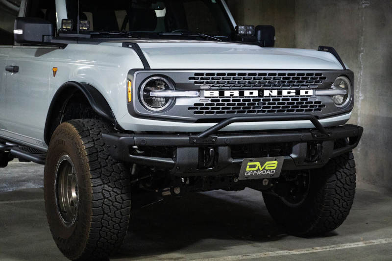 Load image into Gallery viewer, DV8 Offroad 21-22 Ford Bronco Factory Front Bumper Licence Relocation Bracket - Front
