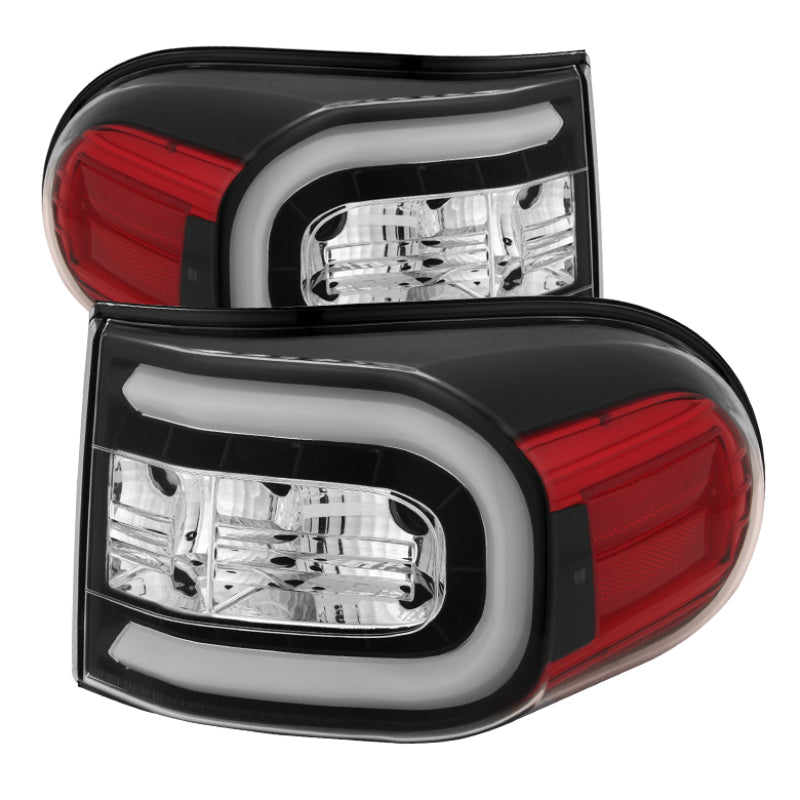 Load image into Gallery viewer, Spyder Toyota FJ Cruiser 07-13 Light Bar LED Tail Lights Black ALT-YD-TFJ07-LBLED-BK
