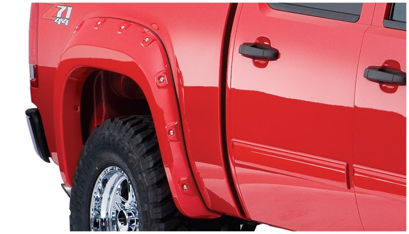 Load image into Gallery viewer, Bushwacker 07-13 GMC Sierra 1500 Fleetside Boss Pocket Style Flares 4pc 69.3in Bed - Black
