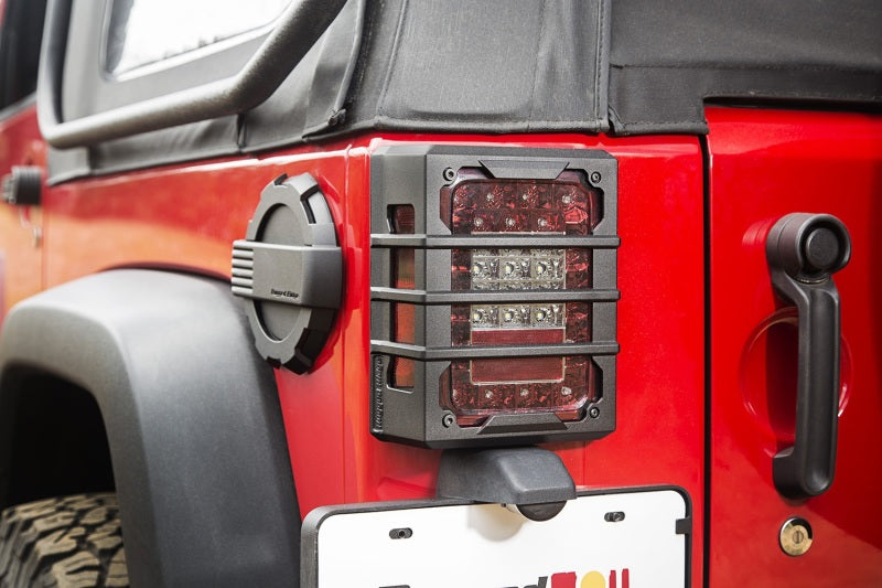 Load image into Gallery viewer, Rugged Ridge 07-18 Jeep Wrangler JK Black Elite Tail Light Guards
