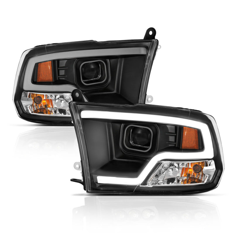 Load image into Gallery viewer, ANZO 09-18 Dodge Ram 1500 Plank Style Projector Headlights Black w/ Halo
