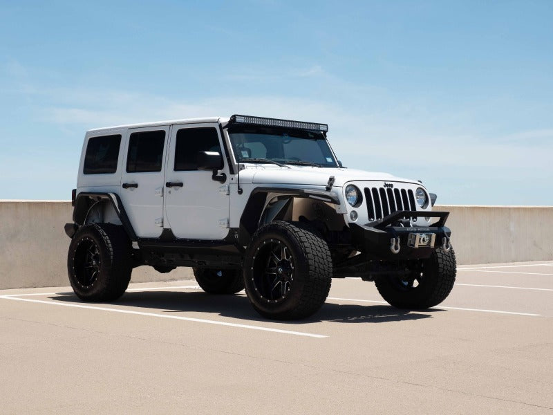 Load image into Gallery viewer, Road Armor 07-18 Jeep Wrangler JKU 4DR Stealth Rear Fender Flare Body Armor - Tex Blk
