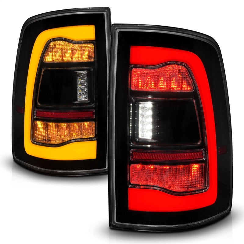 Load image into Gallery viewer, ANZO 09-18 Dodge Ram 1500 Sequential LED Taillights Smoke Black w/Switchback Amber Signal
