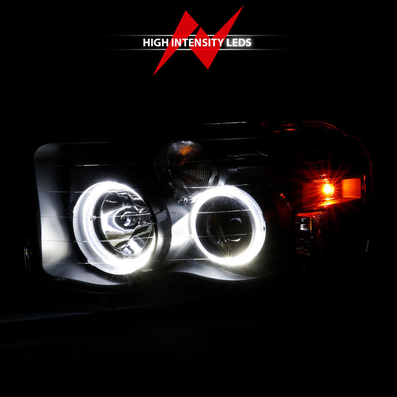 Load image into Gallery viewer, ANZO 2002-2005 Dodge Ram 1500 Projector Headlights w/ Halo Black Clear Amber
