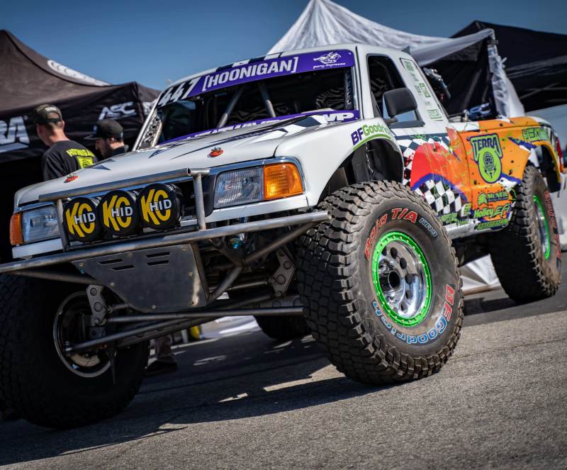 Load image into Gallery viewer, KC HiLiTES 8in. Round Soft Cover HID (Pair) - Black w/Yellow Brushed KC Logo
