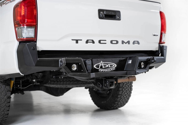 Load image into Gallery viewer, Addictive Desert Designs 16-19 Toyota Tacoma Stealth Fighter Rear Bumper w/ Backup Sensor Cutouts
