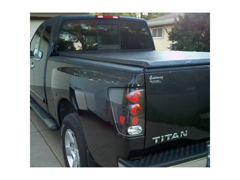 Load image into Gallery viewer, Spyder Nissan Titan 04-14 Euro Style Tail Lights Black ALT-YD-NTI04-BK
