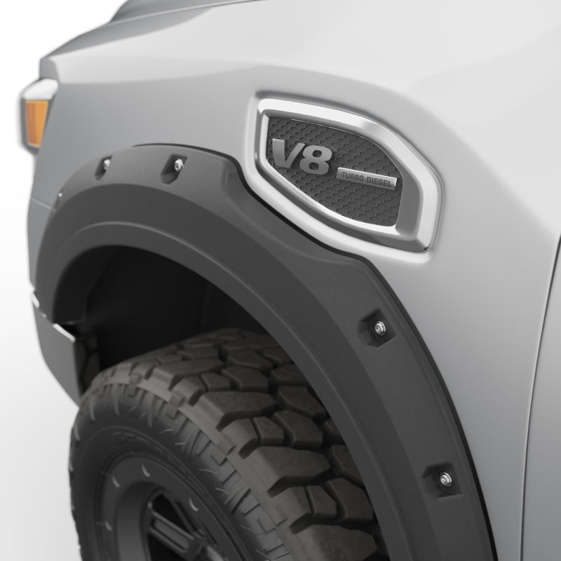 Load image into Gallery viewer, EGR 17-23 Nissan Titan Traditional Bolt-On Look Fender Flareswith Fender Badge Set Of 4
