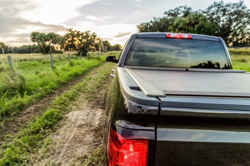 Load image into Gallery viewer, Roll-N-Lock 15-18 Ford F-150 SB 77-3/8in A-Series Retractable Tonneau Cover
