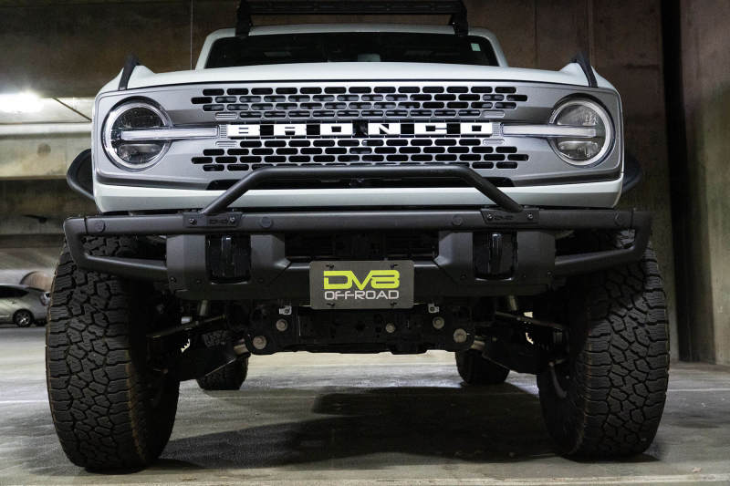 Load image into Gallery viewer, DV8 Offroad 21-22 Ford Bronco Factory Front Bumper Licence Relocation Bracket - Front
