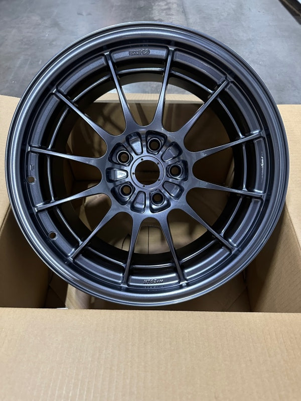 Load image into Gallery viewer, Enkei NT03+M 18x9.5 5x114.3 40mm Offset 72.6mm Bore Gunmetal Wheel *MOQ 40
