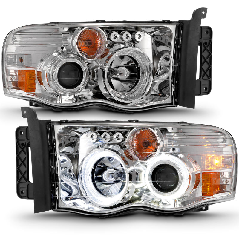 Load image into Gallery viewer, ANZO 2002-2005 Dodge Ram 1500 Projector Headlights w/ Halo Chrome Clear Amber
