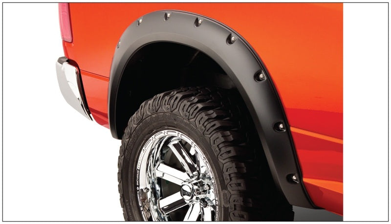 Load image into Gallery viewer, Bushwacker 09-18 Dodge Ram 1500 Fleetside Pocket Style Flares 4pc 67.4/76.3/96.3in Bed - Black
