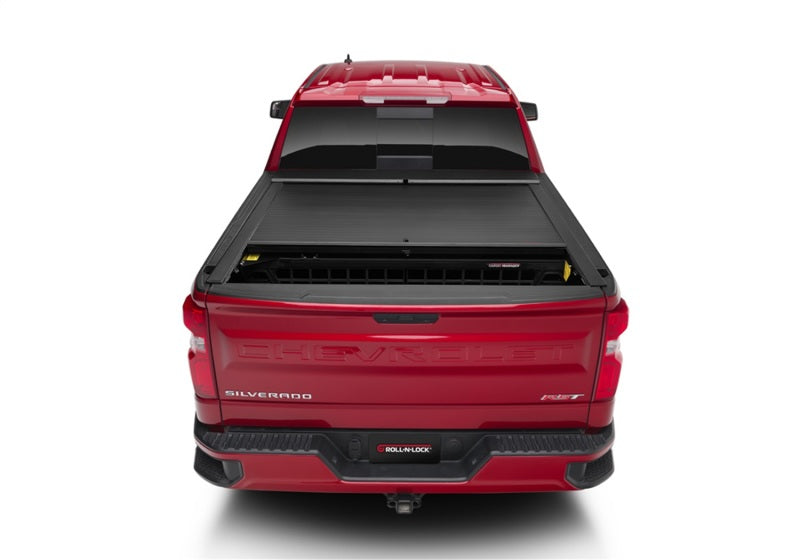 Load image into Gallery viewer, Roll-N-Lock 07-13 Chevy Silverado/Sierra w/ OE Rail Caps LB 96-1/4in Cargo Manager
