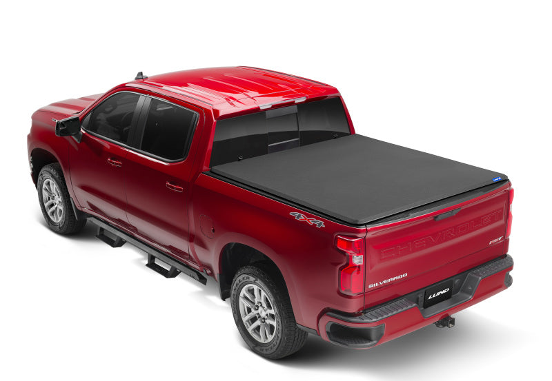 Load image into Gallery viewer, Lund 14-17 Chevy Silverado 1500 (6.5ft. Bed) Genesis Elite Tri-Fold Tonneau Cover - Black
