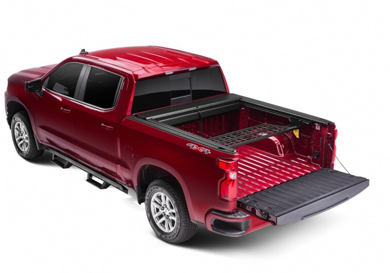 Load image into Gallery viewer, Roll-N-Lock 04-07 Chevy Silverado/Sierra Denali 1500 Crew Cab XSB 68-2/16in Cargo Manager
