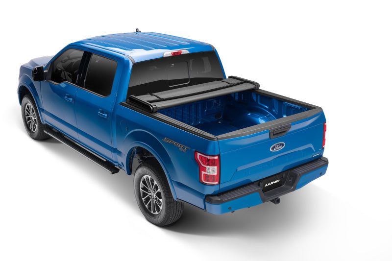 Load image into Gallery viewer, Lund 07-17 Toyota Tundra (5.5ft. Bed) Genesis Elite Tri-Fold Tonneau Cover - Black
