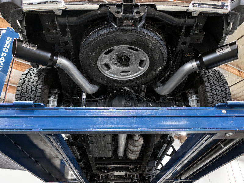 Load image into Gallery viewer, aFe LARGE Bore HD 4in Dual DPF-Back SS Exhaust w/Polished Tip 16-17 GM Diesel Truck V8-6.6L (td) LML
