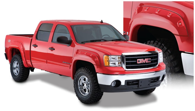 Load image into Gallery viewer, Bushwacker 07-14 GMC Sierra 2500 HD Fleetside Cutout Style Flares 4pc 78.7/97.6in Bed - Black
