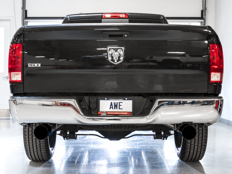 Load image into Gallery viewer, AWE Tuning 09-18 RAM 1500 5.7L (w/o Cutout) 0FG Dual Rear Exit Cat-Back Exhaust - Diamond Black Tips
