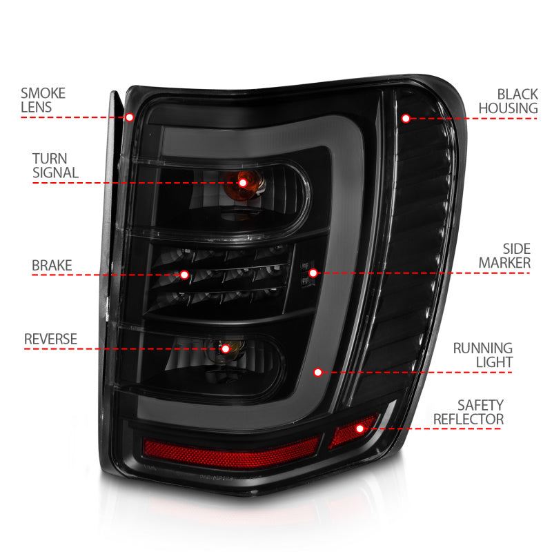 Load image into Gallery viewer, ANZO 1999-2004 Jeep Grand Cherokee LED Tail Lights w/ Light Bar Black Housing Smoke Lens
