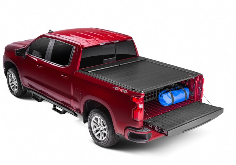 Load image into Gallery viewer, Roll-N-Lock 2019 Chevy Silverado / GMC Sierra 1500 68in Cargo Manager
