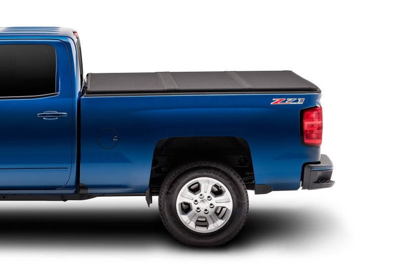 Load image into Gallery viewer, Extang 07-13 Chevy/GMC Silv/Sierra (5ft 8in) w/o Track System Solid Fold 2.0
