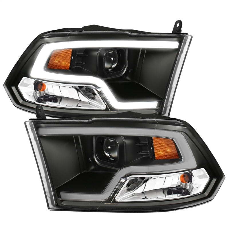 Load image into Gallery viewer, ANZO 09-18 Dodge Ram 1500 Plank Style Projector Headlights Black w/ Halo
