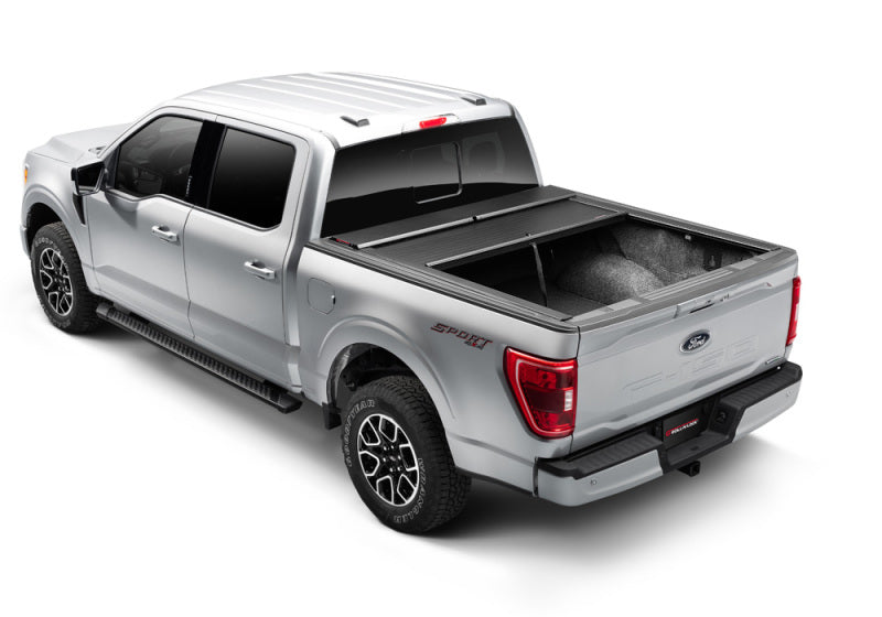 Load image into Gallery viewer, Roll-N-Lock 15-18 Ford F-150 SB 77-3/8in A-Series Retractable Tonneau Cover
