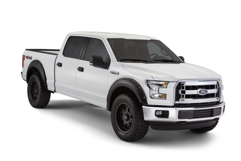 Load image into Gallery viewer, Bushwacker 15-17 Ford F-150 Styleside Pocket Style Flares 4pc 67.1/78.9/97.6in Bed - Black
