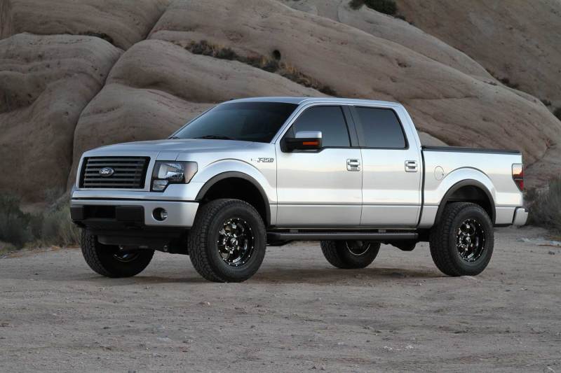 Load image into Gallery viewer, Fabtech 09-13 Ford F150 4WD 4in Basic Sys w/Perf Shks
