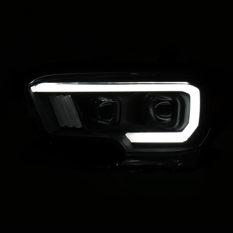 Load image into Gallery viewer, ANZO 2016-2017 Toyota Tacoma Projector Headlights w/ Plank Style Switchback Black w/ Amber
