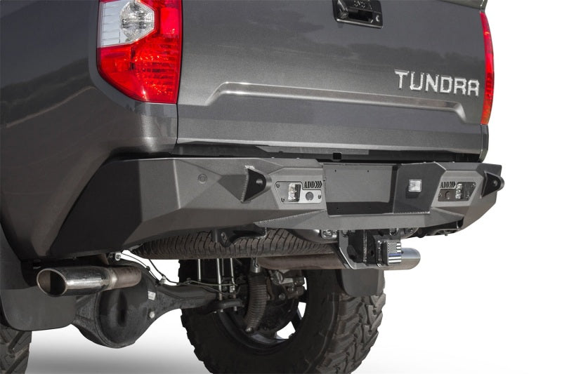 Load image into Gallery viewer, Addictive Desert Designs 2014+ Toyota Tundra Stealth Fighter Rear Bumper w/ Backup Sensor Cutouts
