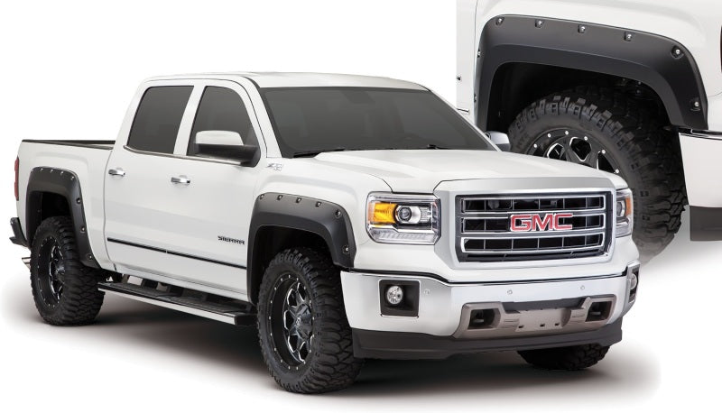 Load image into Gallery viewer, Bushwacker 14-15 GMC Sierra 1500 Pocket Style Flares 4pc - Black
