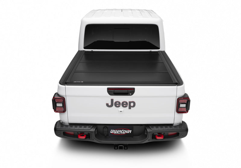 Load image into Gallery viewer, UnderCover 2020 Jeep Gladiator 5ft Ultra Flex Bed Cover - Matte Black Finish
