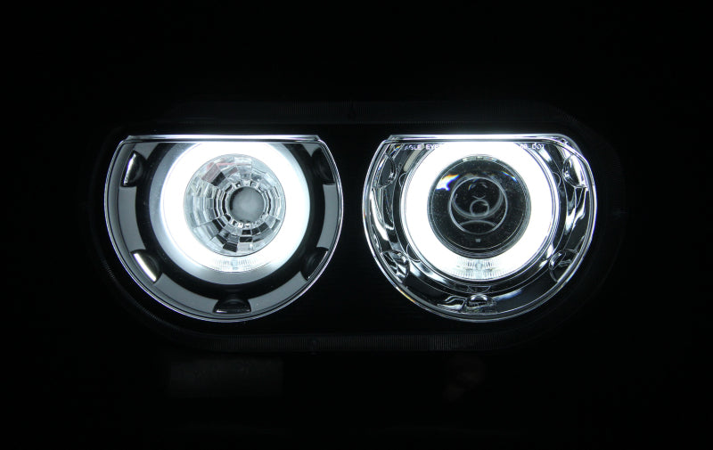 Load image into Gallery viewer, ANZO 2008-2014 Dodge Challenger Projector Headlights w/ Halo Black (CCFL)
